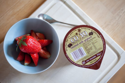 Vegan coconut yogurt and strawberries