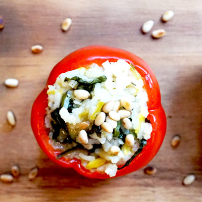 Vegan peppers stuffed with leek risotto
