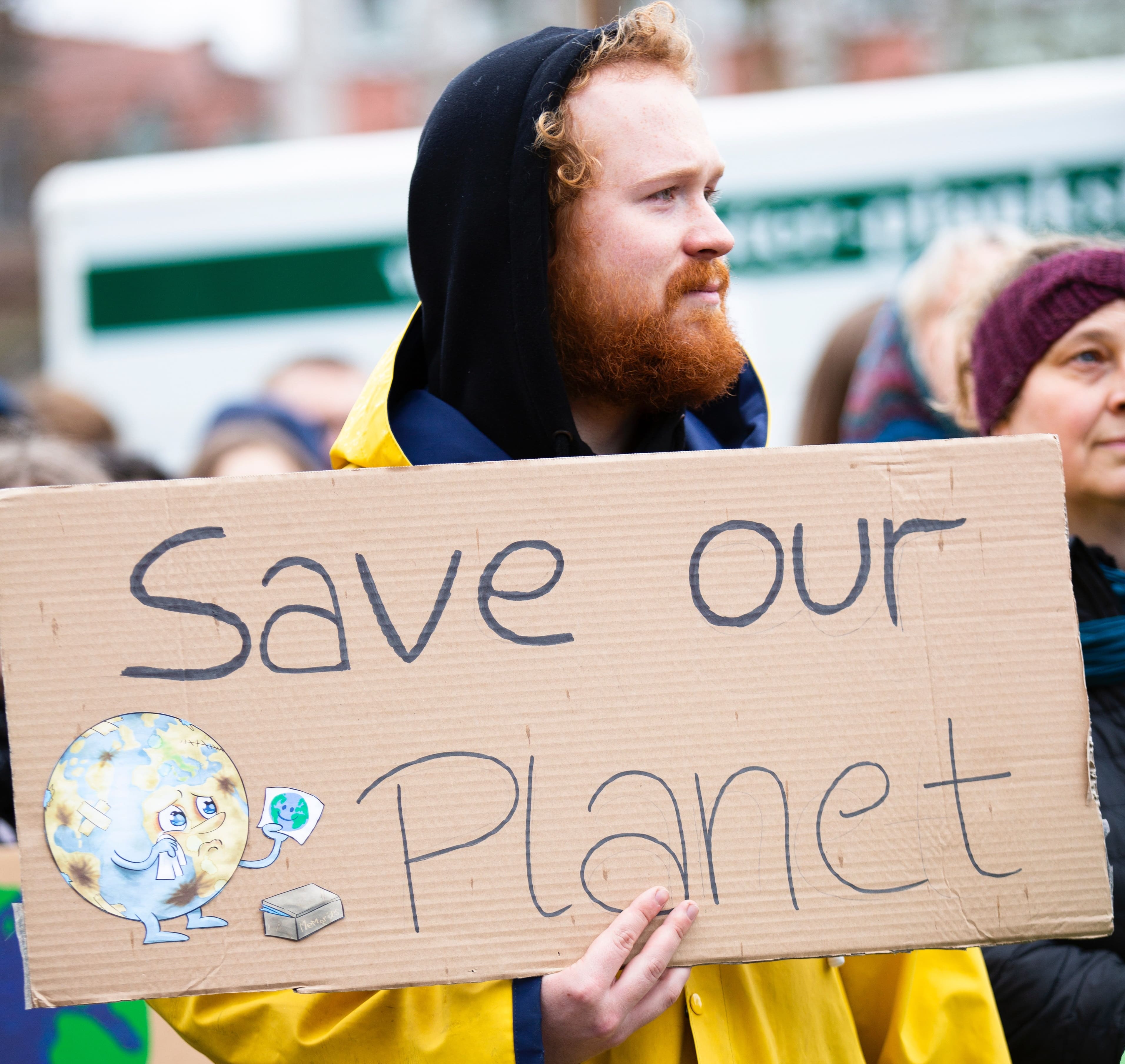 "Save our planet" sign at protest