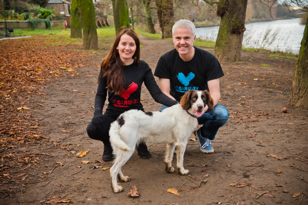 Veganuary's founders Jane and Matthew in a park with their dog