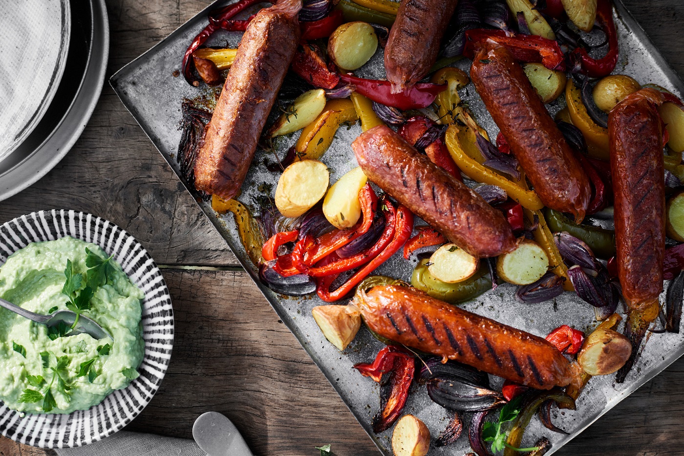 Grilled Plant-Based Sausages with Roasted Potatoes & Peppers recipe