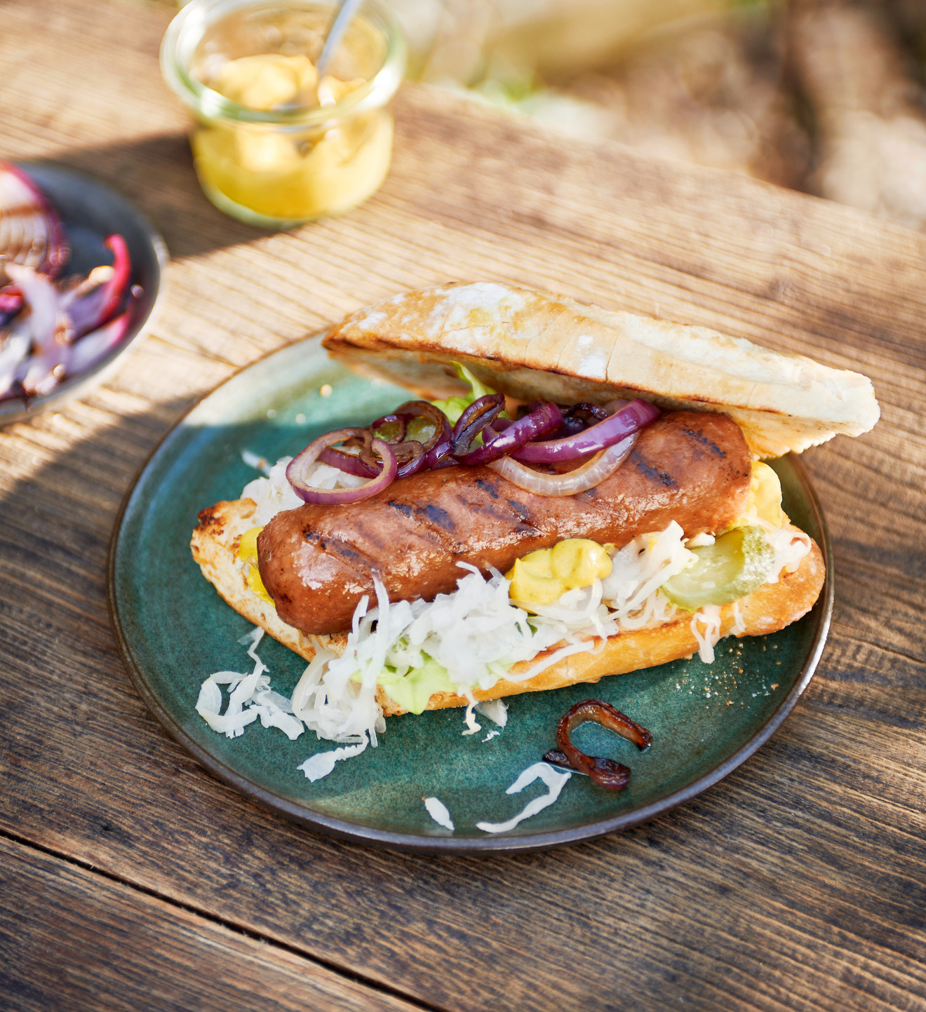 Vegan Hot Dog with Sauerkraut, Pickles and Fried Onions