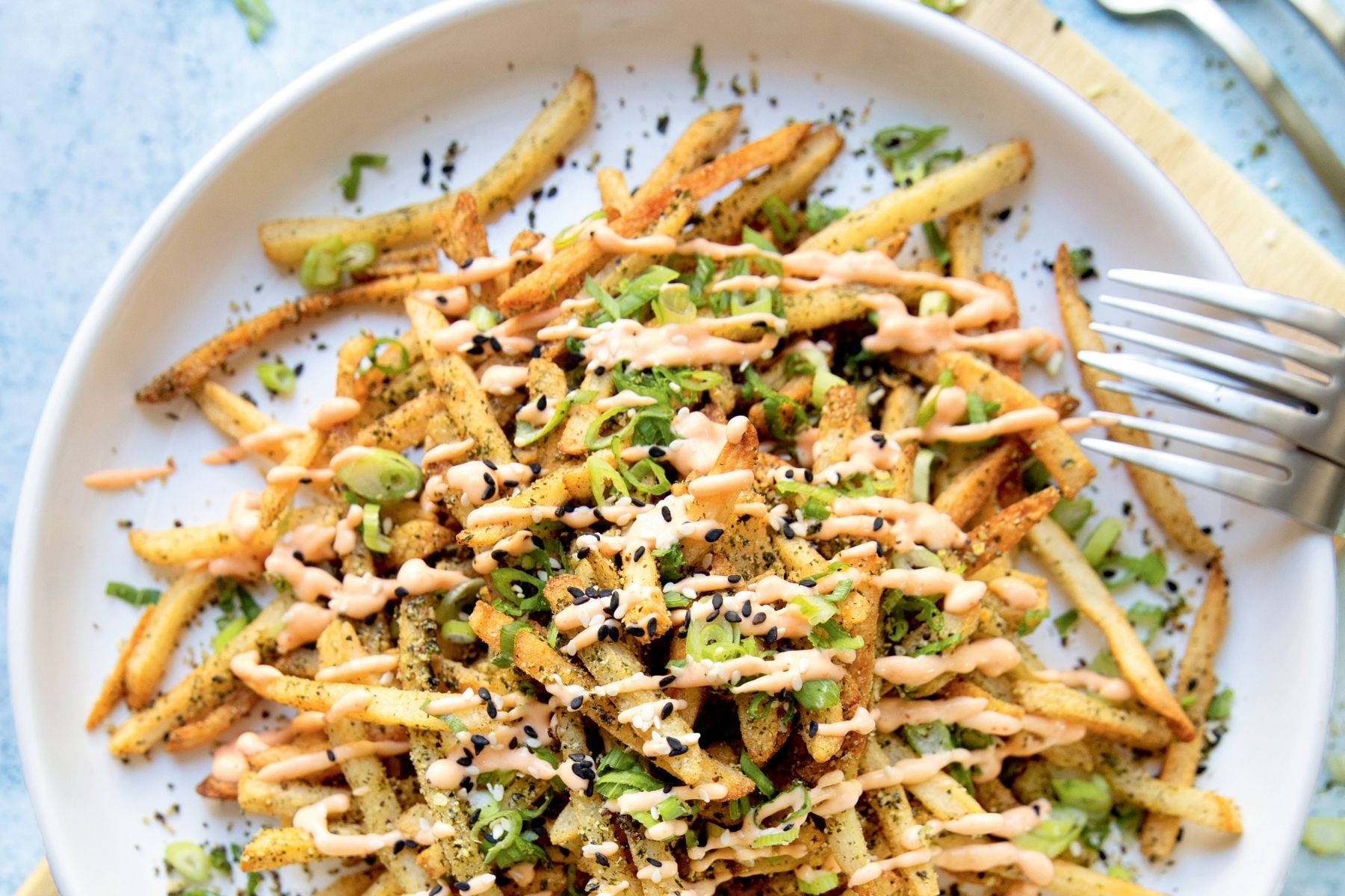 Shoestring fries covered in Japanese-inspired toppings