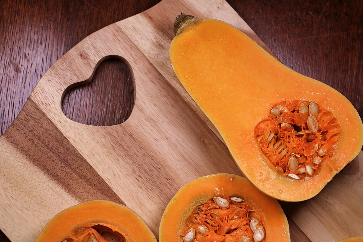 Butternut squash on a chopping board - a great source of vitamin A