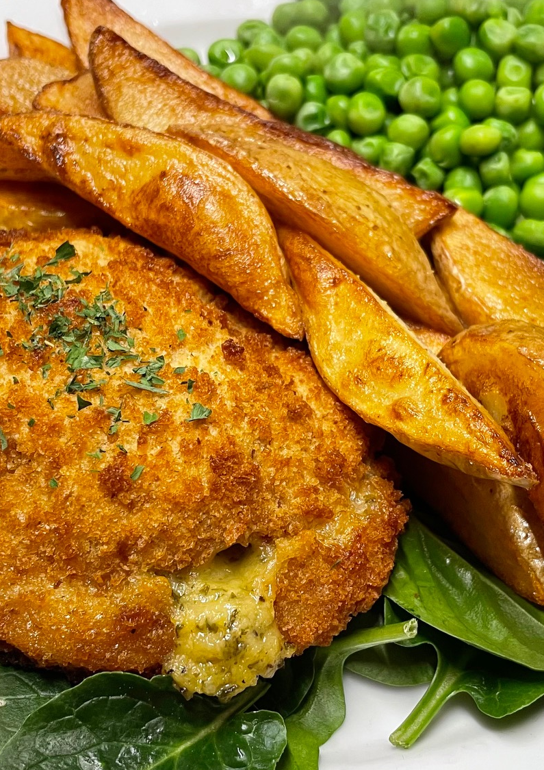 The Queen Inn's vegan chicken kiev, chips and peas