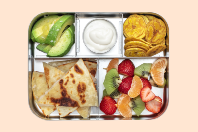 School lunch tray on light orange background