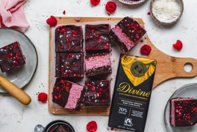 Three layer raspberry and chocolate brownie topped with raspberry and sea salt flakes.