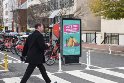 Photo of Veganuary billboards at the end of a bicycle stand in Washington, D.C.