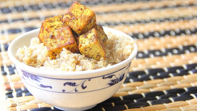 Vegan CARIBBEAN TOFU Marinade WITH COCONUT QUINOA in a bowl 