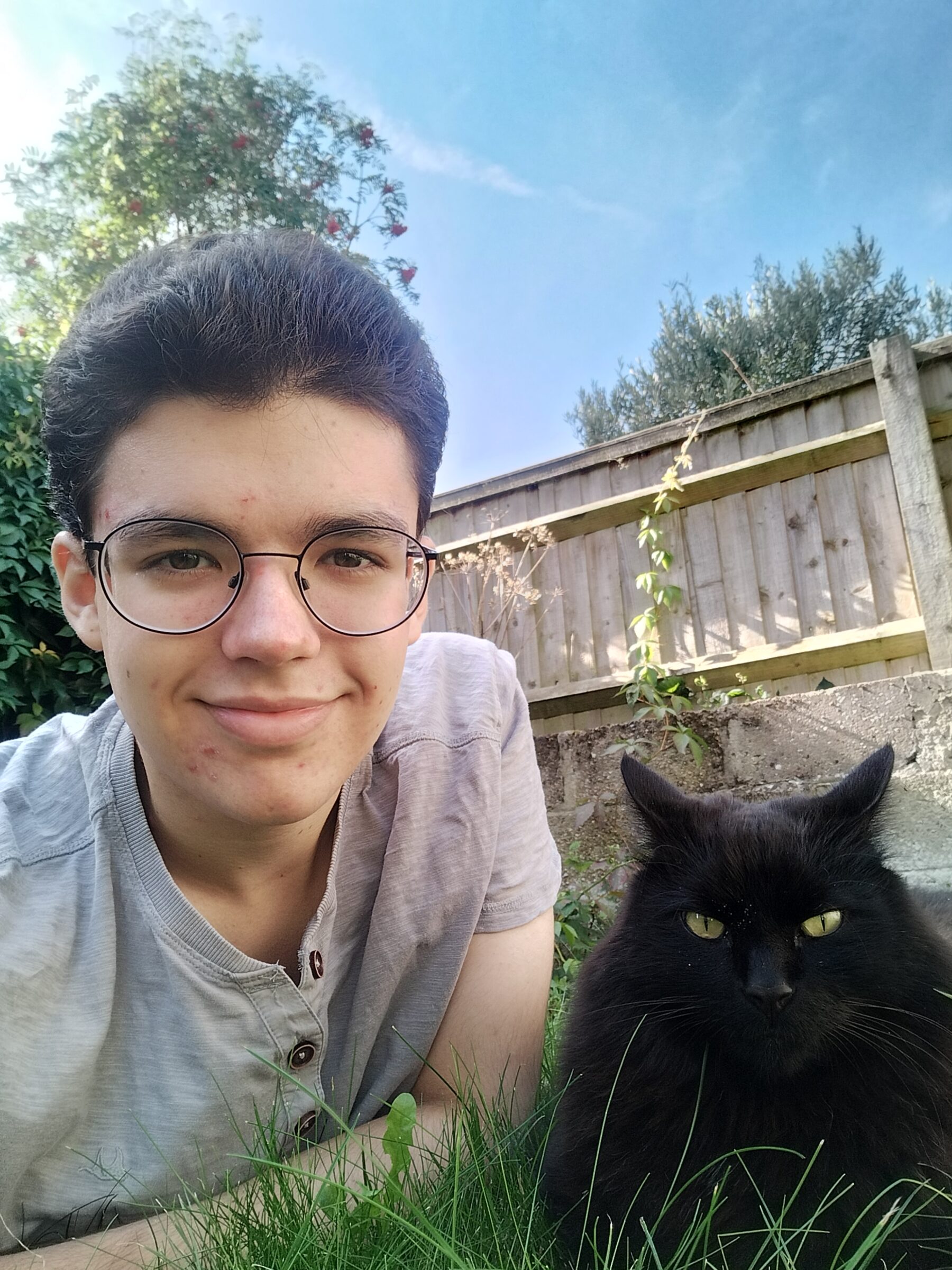 Christopher with his rescued cat, Leo 